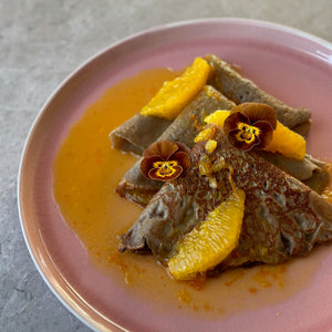 Gluten free cardamom crepes with a orange & cinnamon sauce